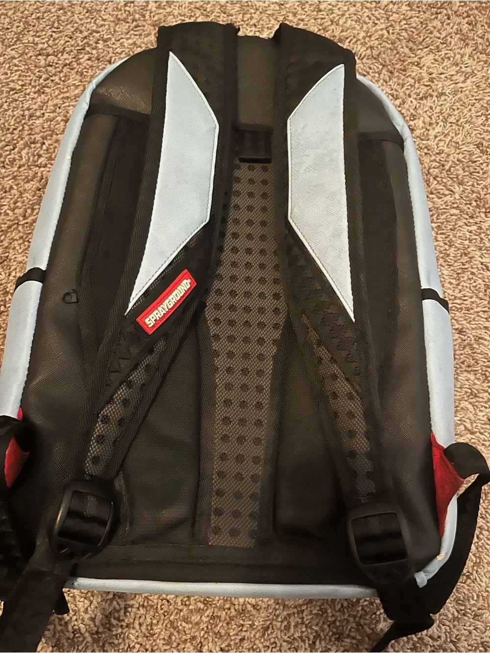 Sprayground Light Blue Backpack.